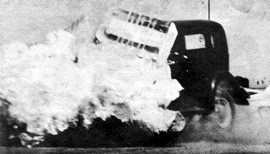 Dutch Schnitzer drives his 1934 Ford straight into a 20 ton pile of ice blocks, at 90 miles per hour